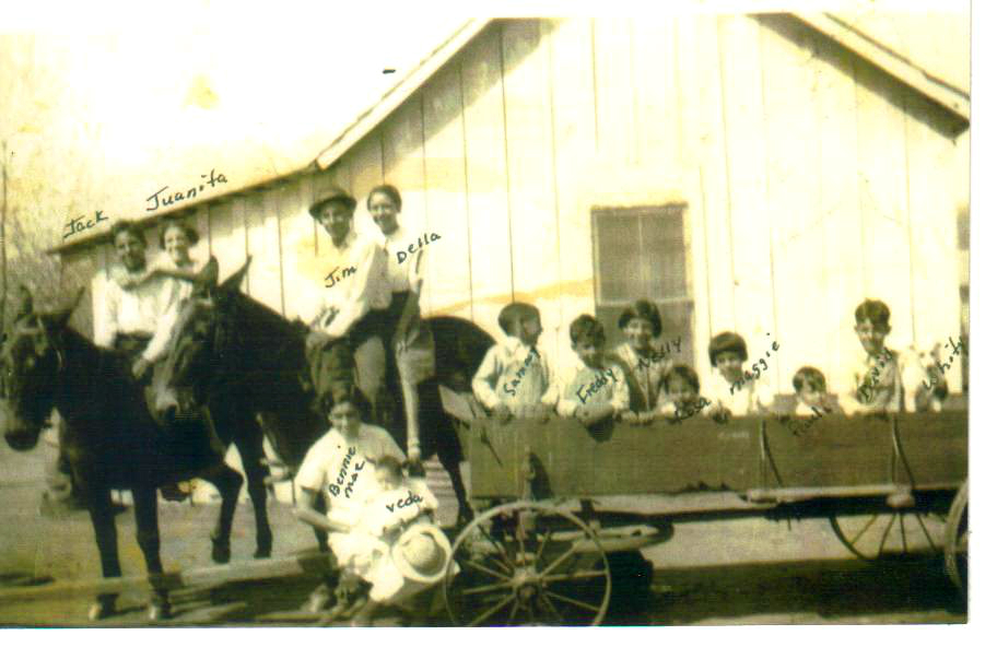 The Gomez Children:  Jack and Juanita Gomez on one horse; Jim Gomez and 
Della Leal on the other horse; Bennie Mae 
Gomez sitting in chair holding her daughter, Veda Mae Gomez; in the 
wagon: Sammy Gomez, Freddy Gomez, Rosalie Gomez, Maggie Gomez, Paul Ra