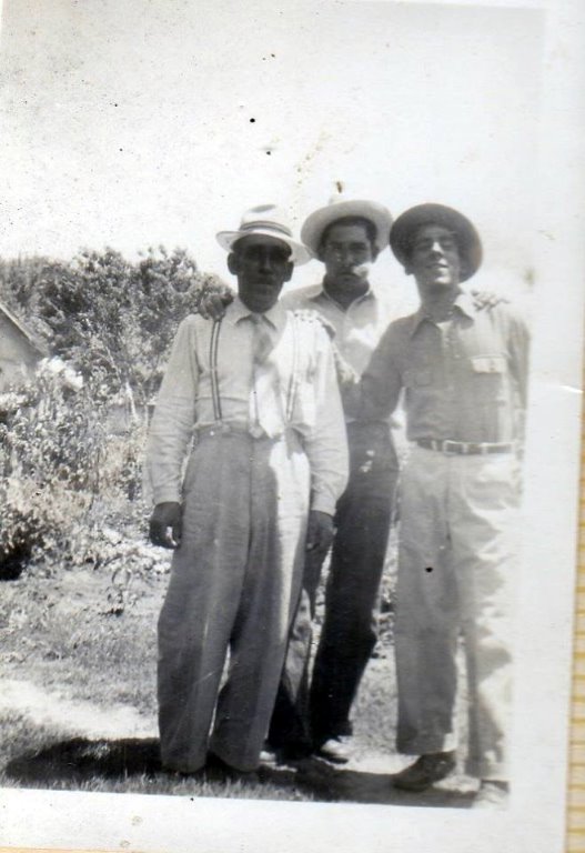 Uncle John R Gomez,  brother of George R Gomez; the man in the middle I do not know, maybe one of our cousins (a Sanches);with G. C. Gomez (son of George R Gomez)