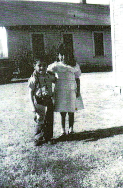 Ernest and Marie Gomez taken in front of their home on Alabama Street in Anadarko,OK;  children of Joe C Gomez and grandchildren of George R and Susana Gomez